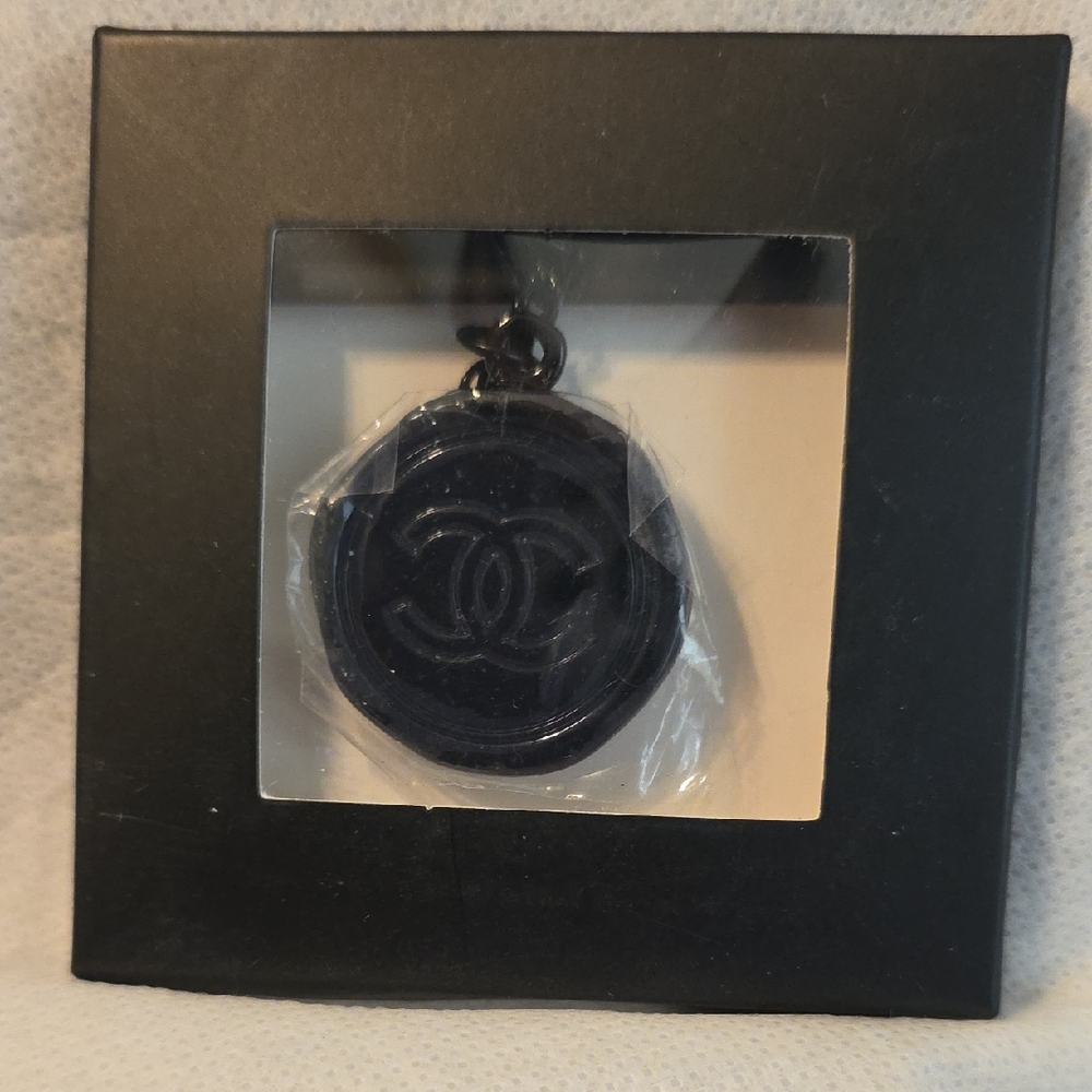 CHANEL Dark Pendant with Iconic Logo
